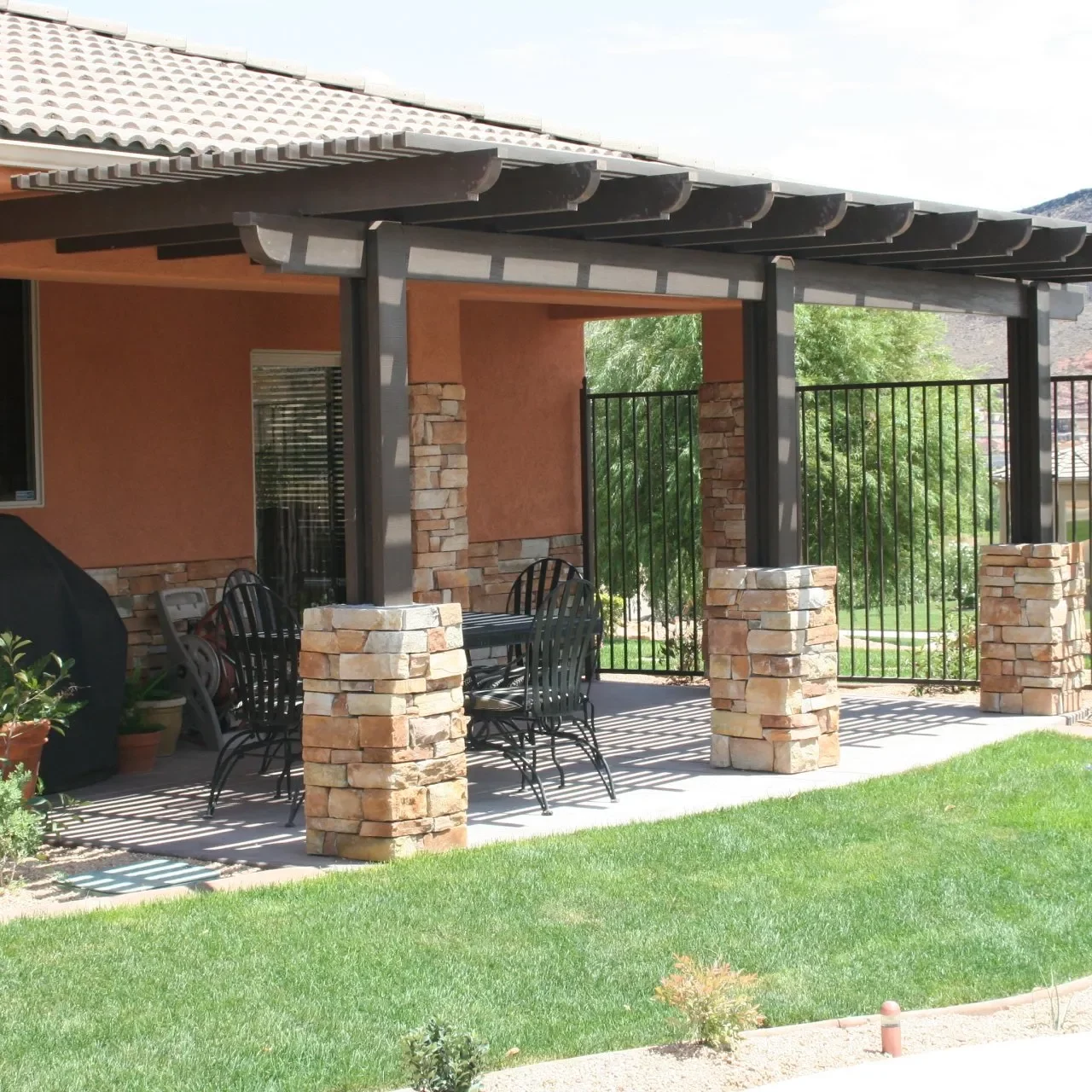 Custom lattice awning covering patio in St. George, UT