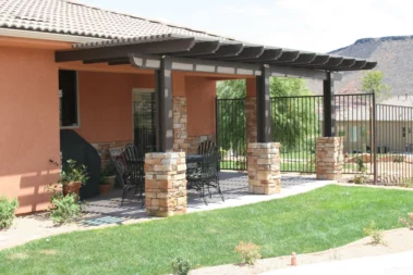 Custom lattice awning covering patio in St. George, UT