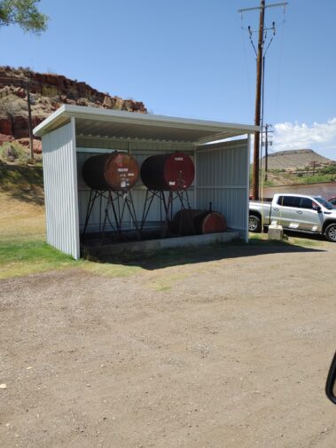 Custom awning covering fuel barrels