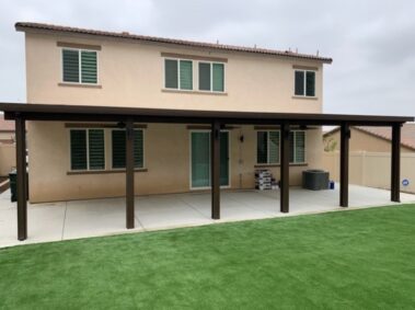 Solid top aluminum patio cover in brown