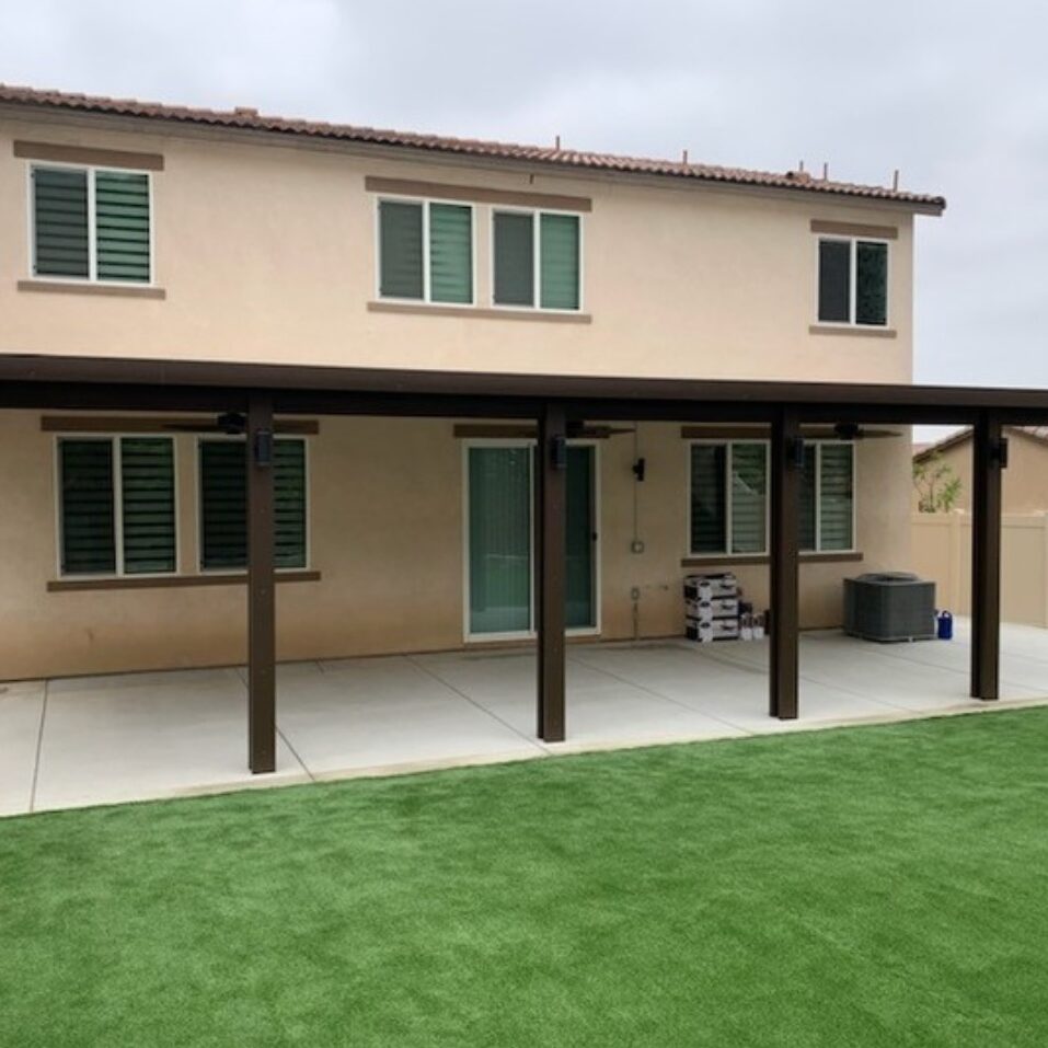 Solid top aluminum patio cover in brown