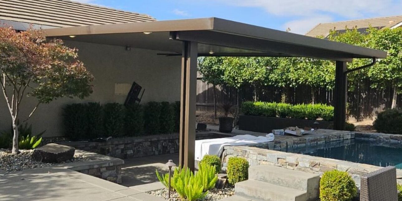 Solid top aluminum patio cover in brown