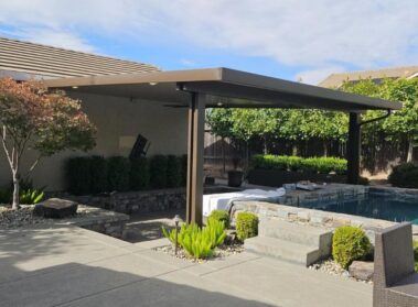 Solid top aluminum patio cover in brown